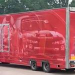 Visual marketing solutions. Vehicle graphics, shop fitting, shop removals merchandising. Lorry with red graphics.